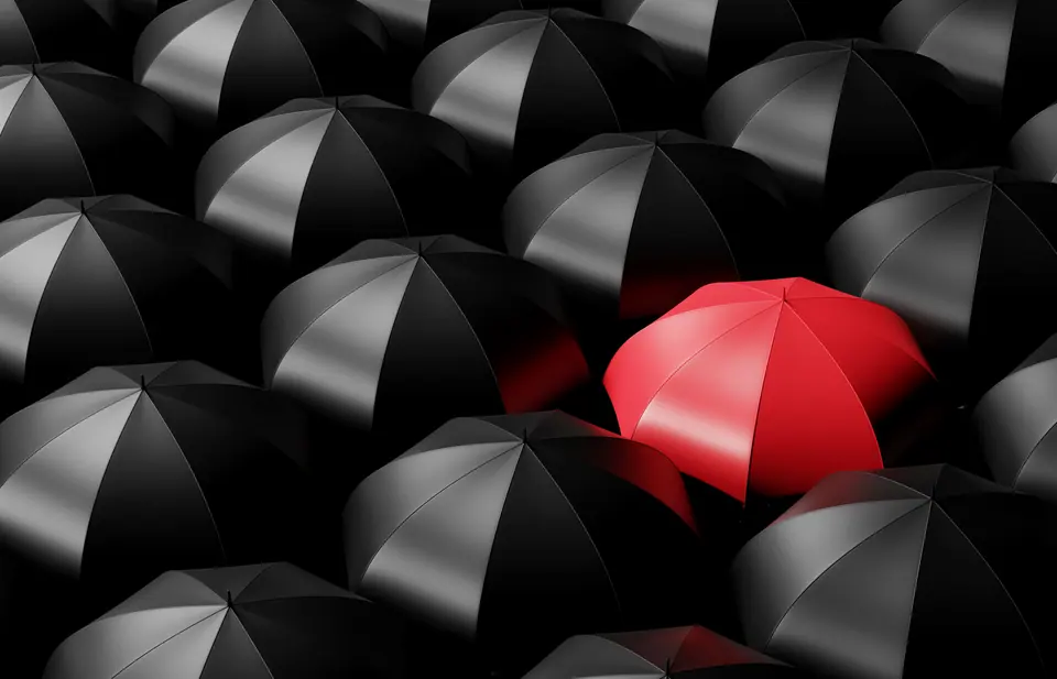 3d concept abstract different business red umbrella among black umbrella dark background