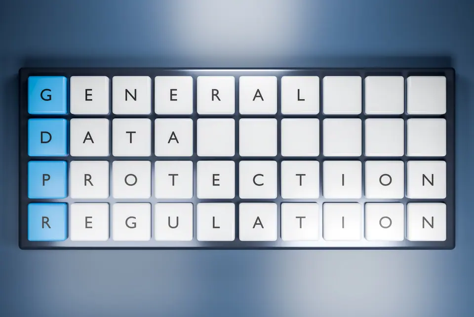 Flat lay 3D rendered graphic of GDPR compliance framework with blue keycaps highlighting General, Data, Protection, and Regulation acronyms