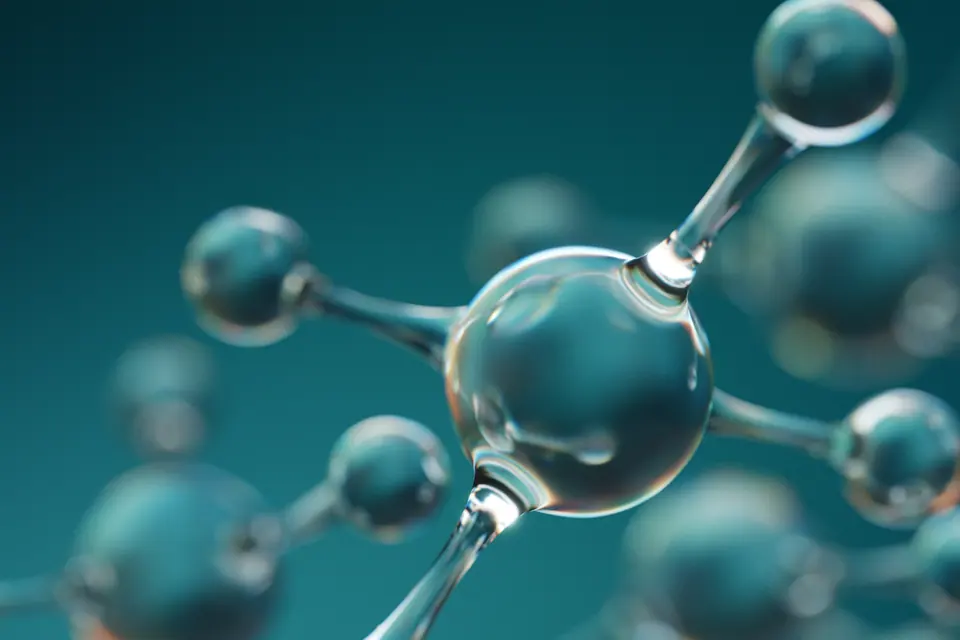 Glossy spherical molecules linked by transparent bonds form a futuristic, abstract illustration evoking chemistry, nanotechnology, biomedical research…