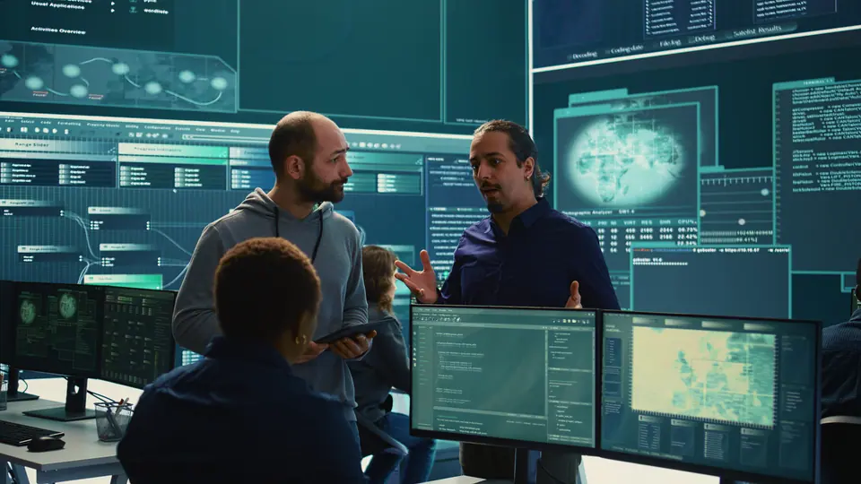 Governmental cyber defense team using advanced technology to secure information, cyber operations in high tech monitoring center