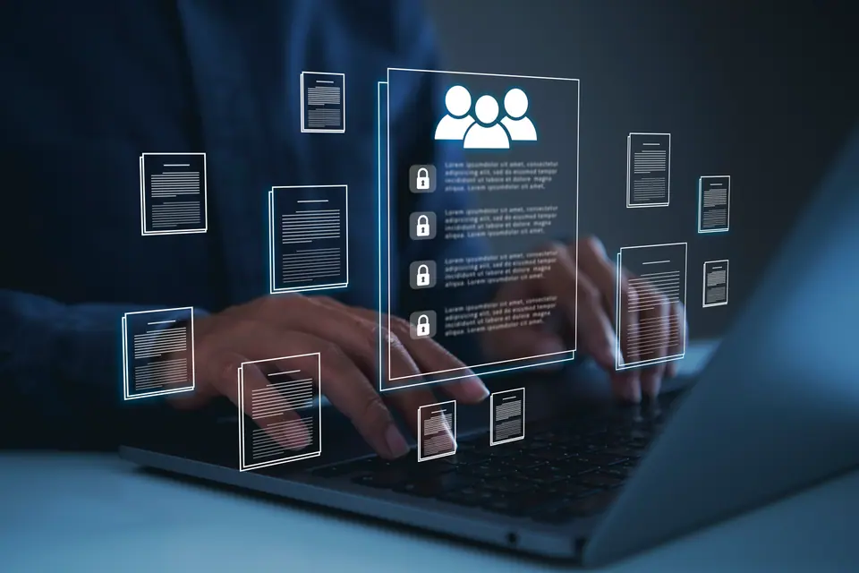 Human resources data management system businessman using laptop virtual employee profile interface to organize corporate documents secure records…