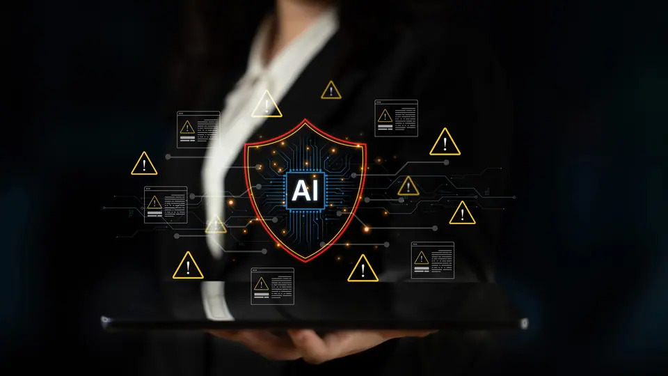 This image showcases a digital concept of artificial intelligence security, emphasizing a shield symbol surrounded by warning signs, highlighting the…