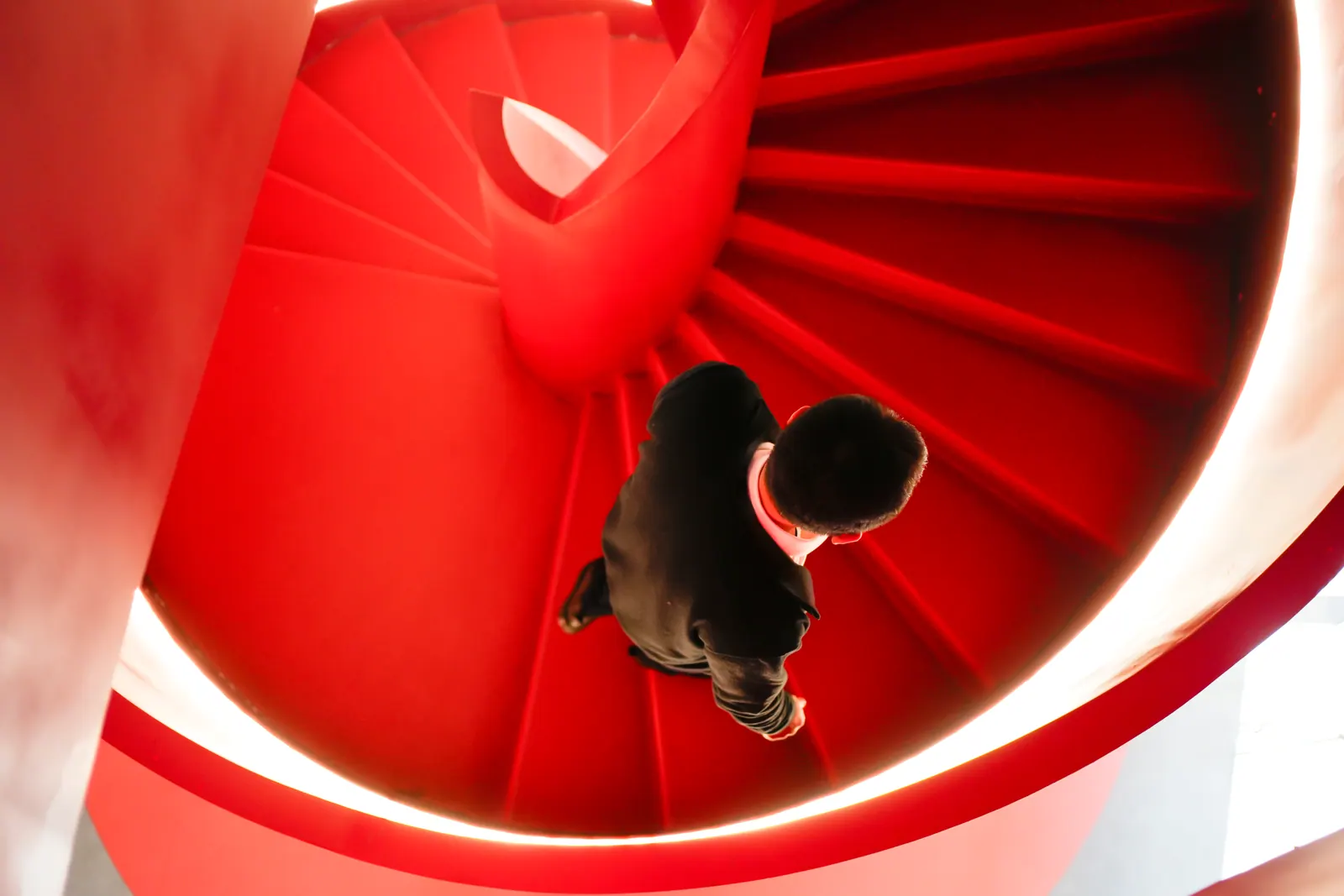 Curved red stairs representing paid advertising performance